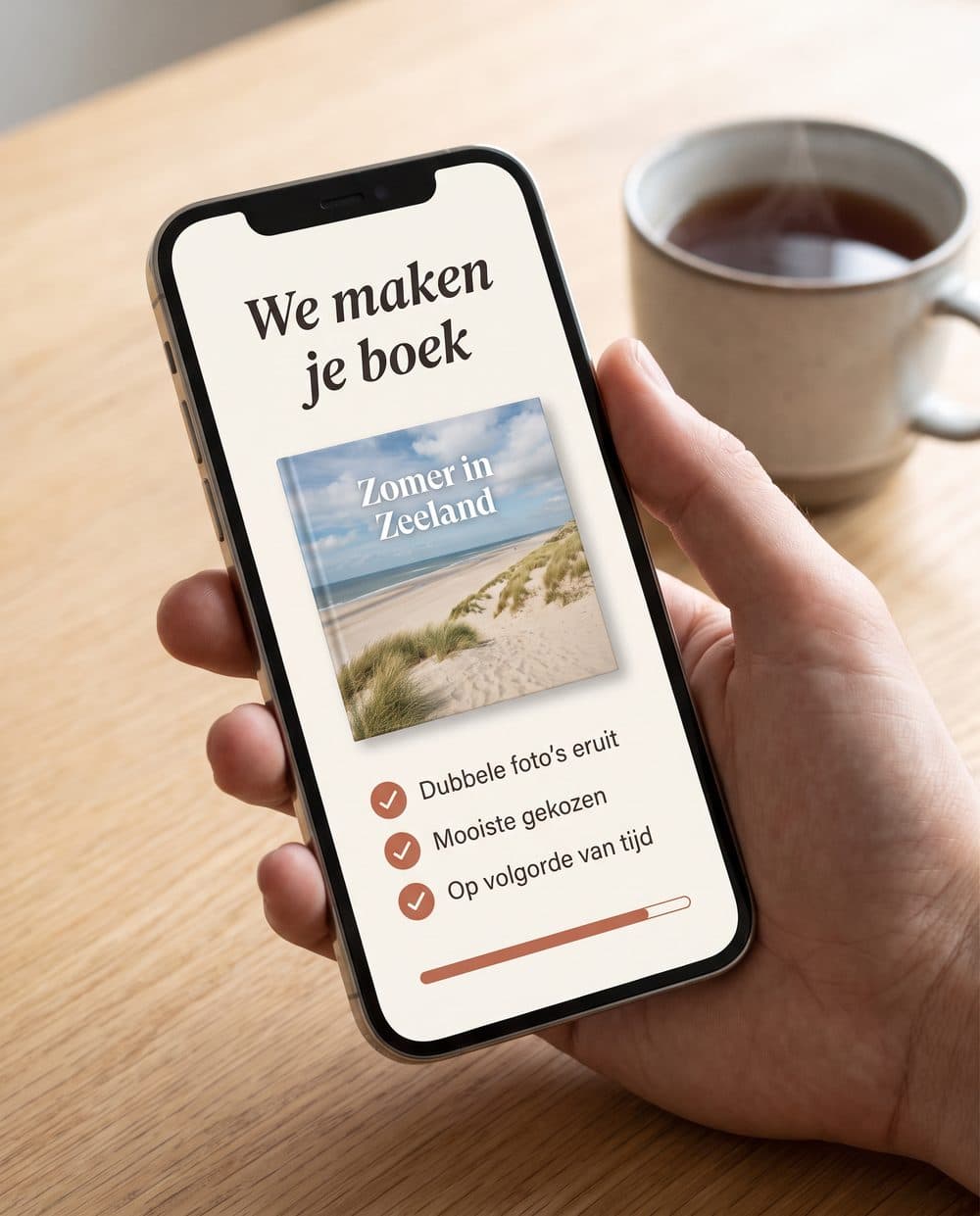 Een telefoon met het scherm We maken je boek